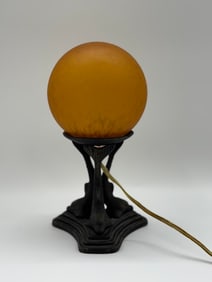 Art Deco Cast Metal Table Lamp with Amber Glass Globe Shade