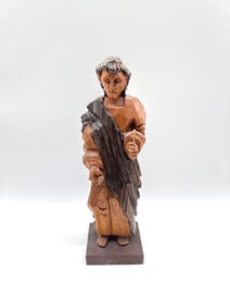 Hand-Carved Wooden Figure Holding Scroll