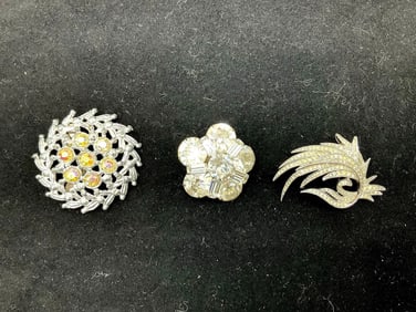 Group of vintage rhinestone brooches