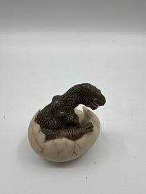Hatching Dinosaur Figurine