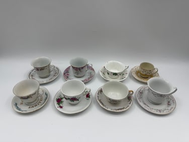 Collection of Eight Decorative Tea Cups and Saucers