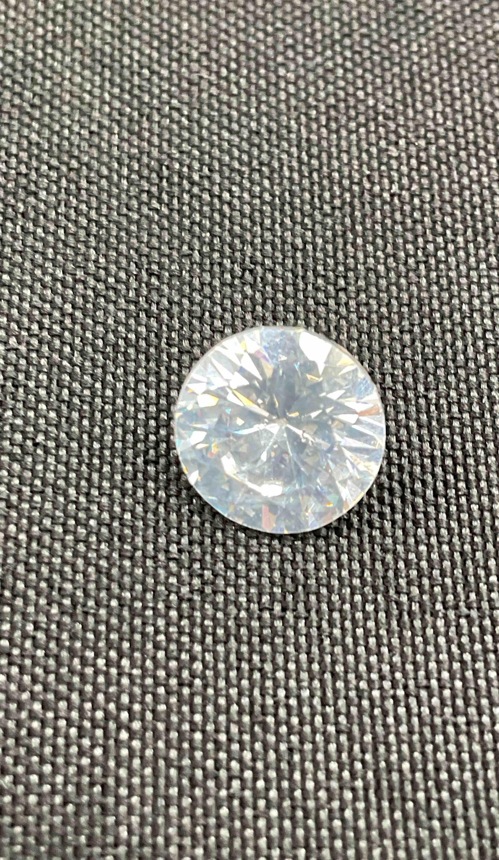 Loose Round Cut White Gemstone (1 of 2)