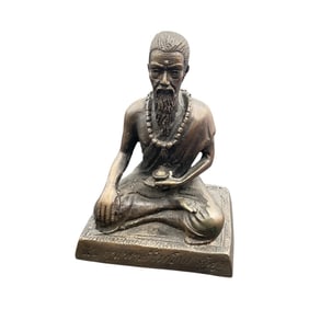 Seated Holy Man Figurine