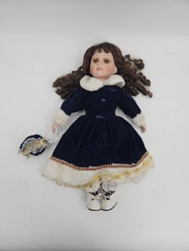 Porcelain Doll in Blue Velvet Dress