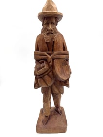 Pair of Hand-Carved Wooden Figures of a Man and Woman with Hats