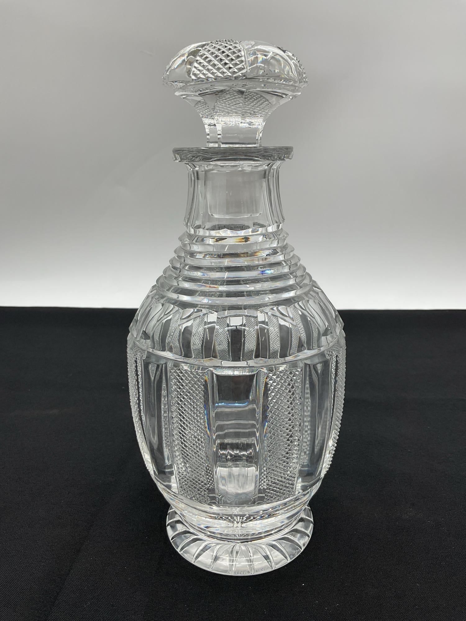William Yeoward Crystal Ship’s Decanter with Starburst Base: Exquisite ship’s decanter by William Yeoward, crafted in fine clear crystal with hand-cut vertical fluting and a wide, stable base. The decanter features a detailed starburst cut on the bottom a