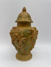 Figural Relief Decorated Vase