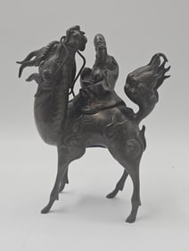 Chinese Bronze Figure of Immortal Riding a Qilin