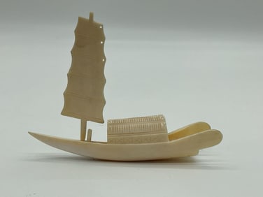 Hand-Carved Canoe with Sail