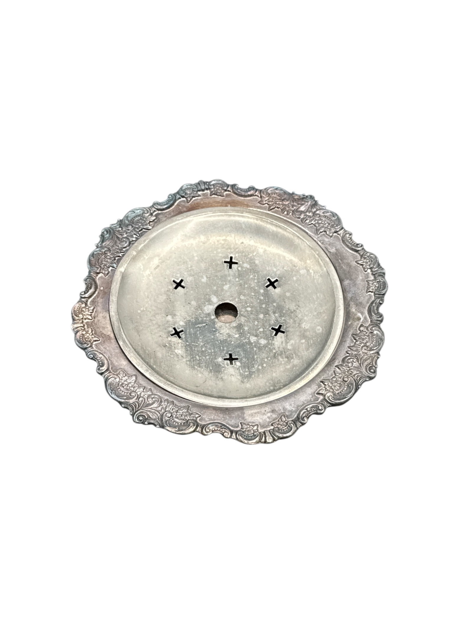 Silverplate Flower Frog with Ornate Rim, 7 inch: Silverplate flower frog featuring an ornate rim and a removable top with multiple holes for flower arrangement. Diameter approximately 7 inches.