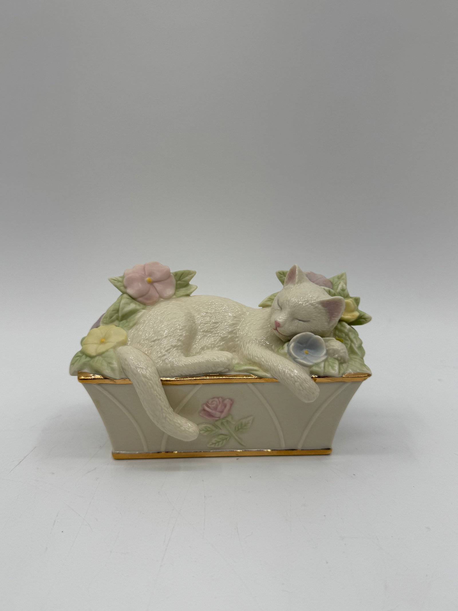 Sleeping Cat Figurine in Floral Planter (1 of 4)