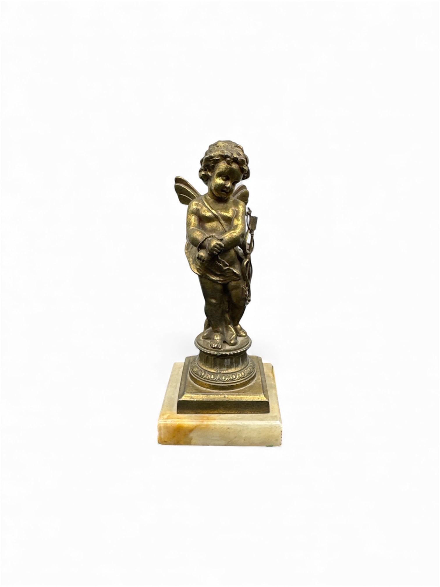 Antique Bronze Cherib Figure on Marble Base: Description: Bronze figure of Cupid holding a bow and arrow, mounted on a decorative bronze base atop a square marble base. Most likely 19th Century. Dimensions: H:8in W:3in
