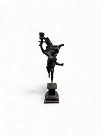 Bronze Figural Cherub Candlestick
