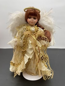Porcelain Angel Doll in Ivory and Gold with Feather Wings