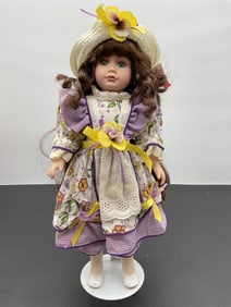 Porcelain Doll in Purple Floral Dress with Sun Hat