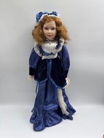 Crowne Fine Porcelain Doll with Blue Velvet and Lace Dress