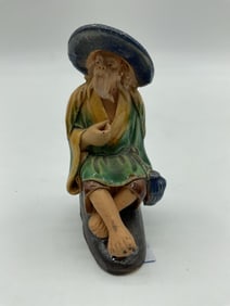 Chinese Mudman Figurine Seated with Jug