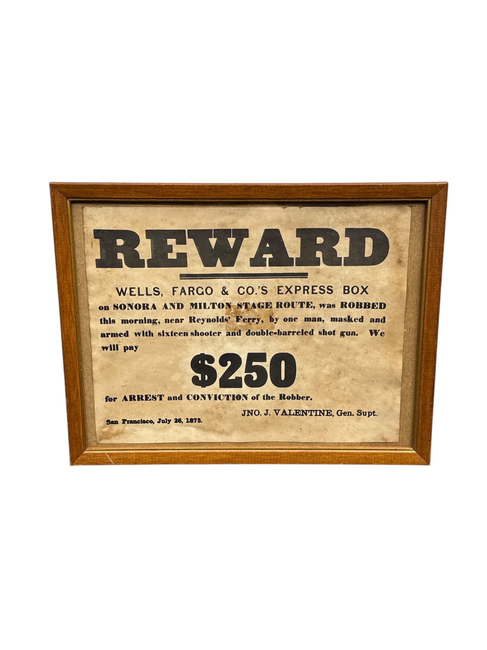1875 Wells Fargo reward poster for a stagecoach robbery: Description: Framed Wells Fargo reward poster. Reads: "REWARD WELLS, FARGO & CO.'S EXPRESS BOX on SONORA AND HILTON STAGE ROUTE, WAS ROBBED this morning, near Reynolds Ferry, by one 