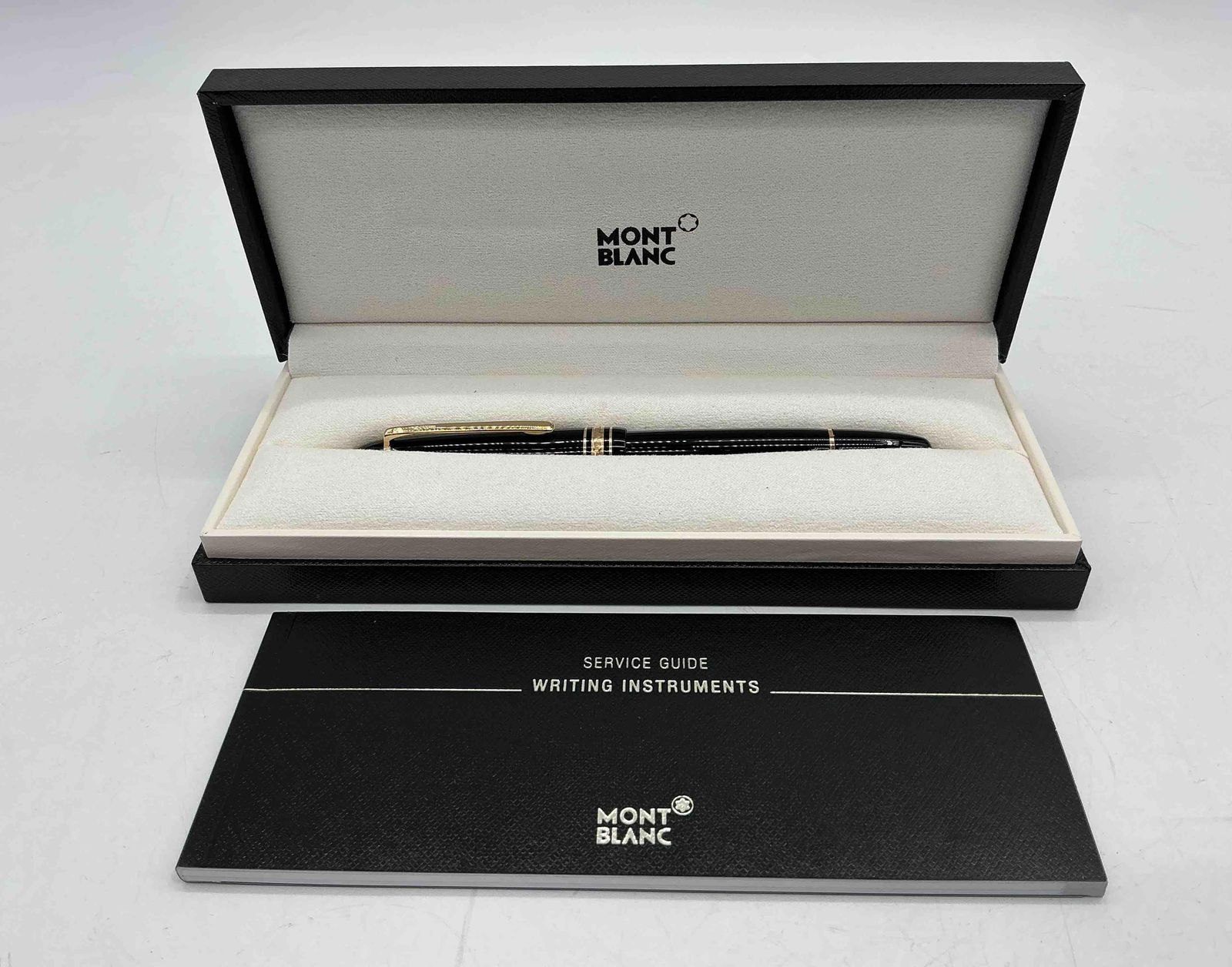 Montblanc LEgrand Meisterstück 14k Gold Nib Fountain Pen: Description: Classic black resin Montblanc Le Grand Meisterstück fountain pen with gold-coated accents, presented in original case.Medium: Resin and gold-plated metal