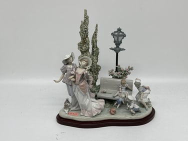 "A stroll in the park" Retired Lladro Porcelain Sculpture