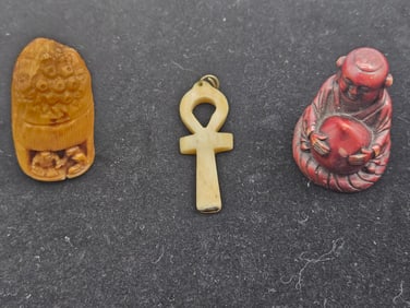 Three Carved Pendants: Netsuke, Ankh, Monk