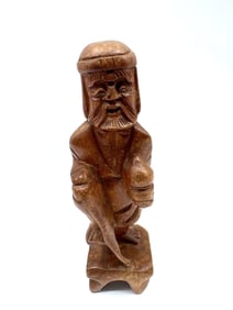 Hand-Carved Wooden Figure of an Elder with Scroll