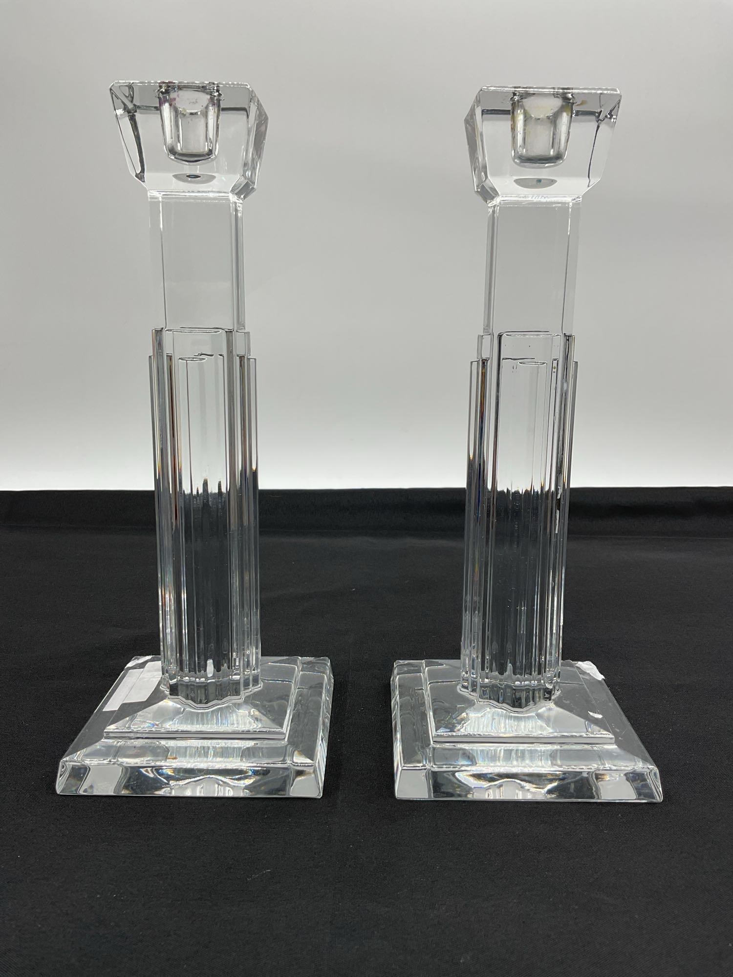 Pair of Waterford Crystal Taper Candle Holders: Elegant pair of signed Waterford crystal candle holders, featuring tall fluted columns with beveled square tops and bases. These heavy, high-clarity pieces reflect Waterford’s classic craftsmans