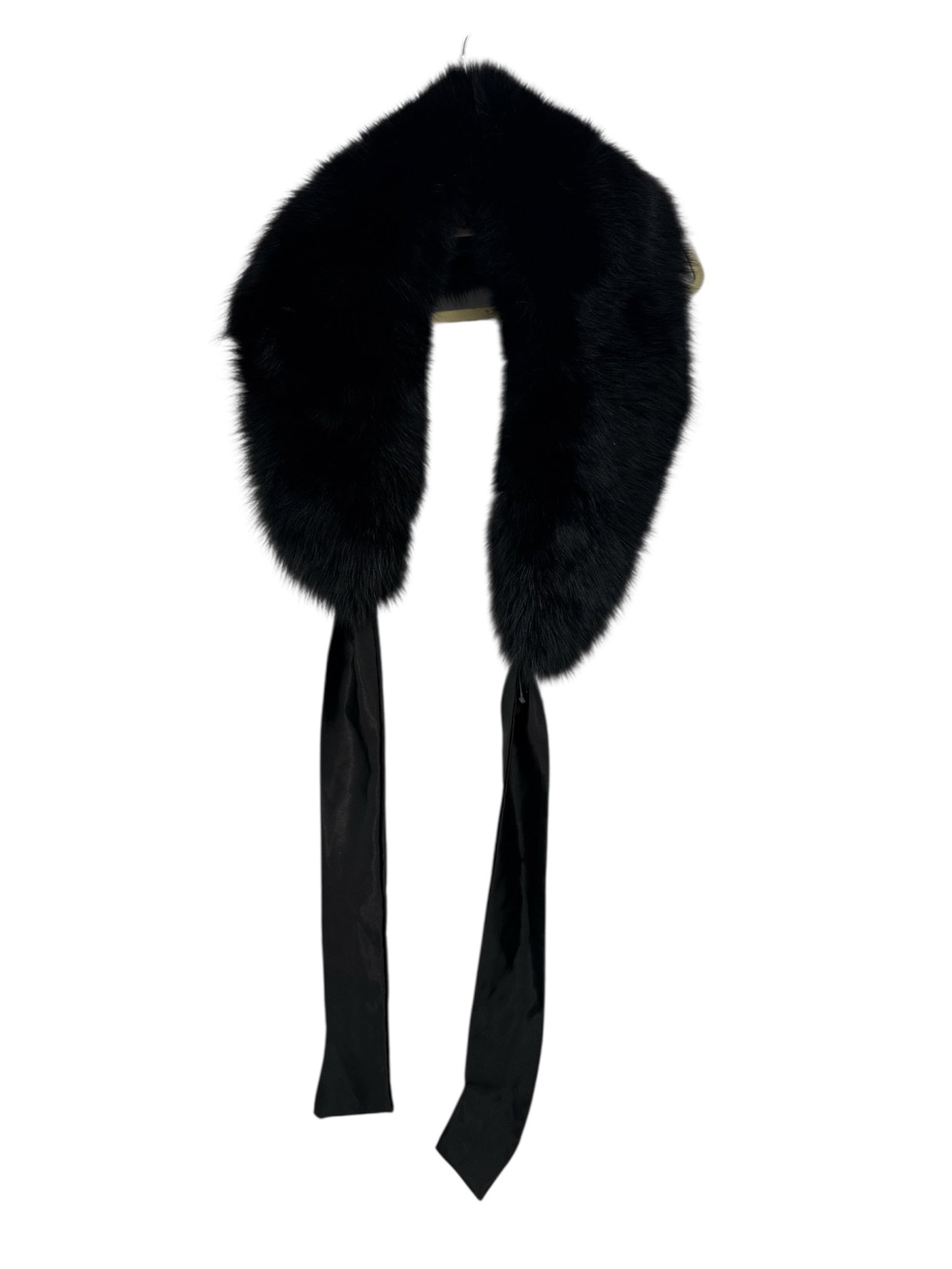 Vintage Black Fur Stole with Tassels: This elegant vintage black fur stole or wrap, possibly crafted from mink or fox fur, offers a touch of classic glamour for formal events or a winter wedding accessory. The plush garment drapes over th