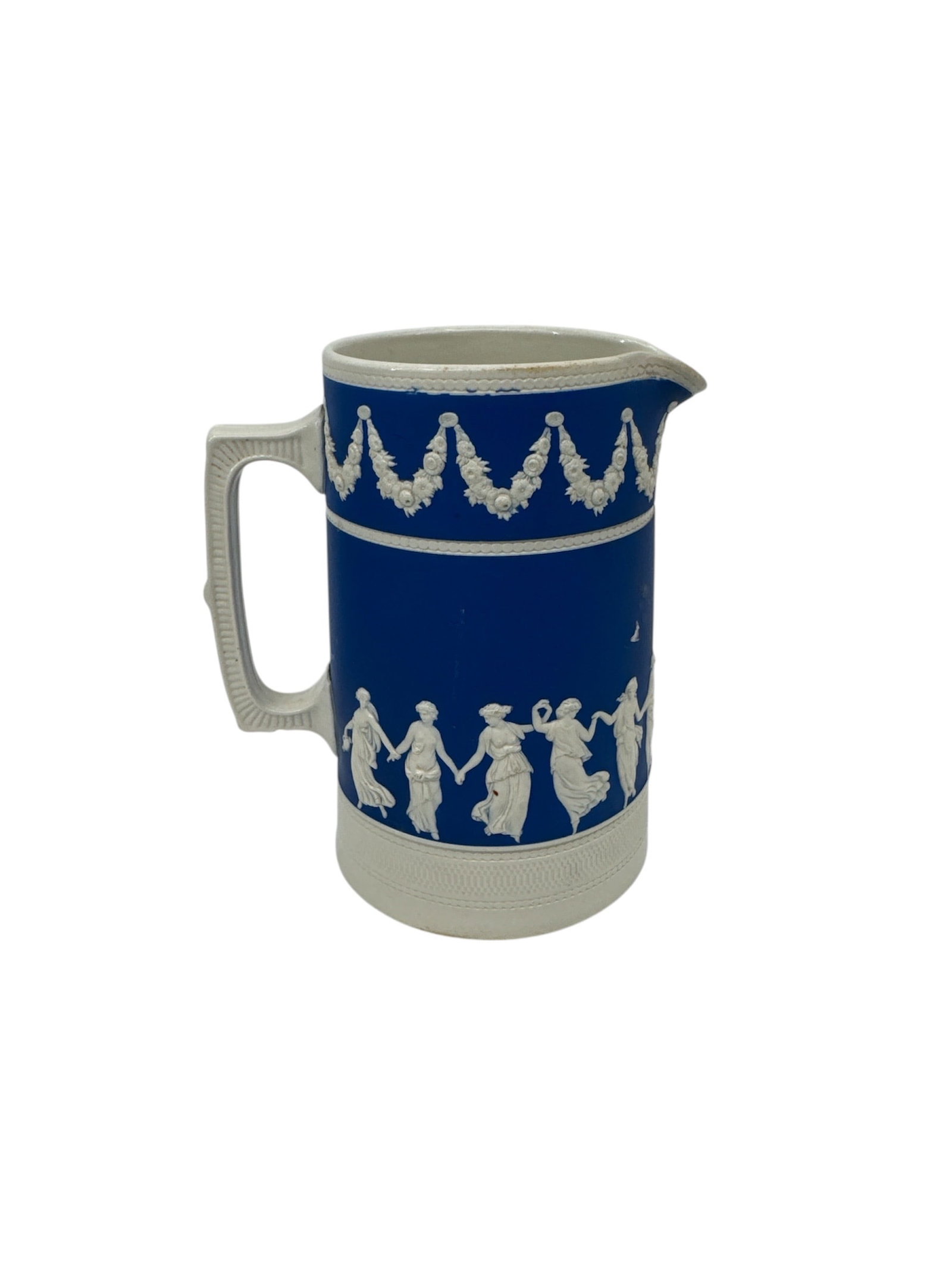 Antique Copeland Spode Blue and White Jasperware Pitcher with Neoclassical Relief: A beautiful antique pitcher crafted in the classic jasperware style, most likely by the esteemed English manufacturer Copeland, later Copeland Spode. This piece features a deep cobalt blue matte groun