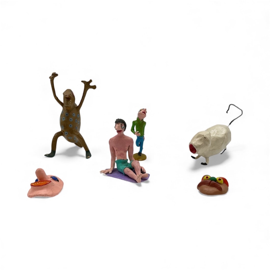 Folk Art Figures and Masks, Assorted: Collection of folk art figures and masks, crafted from mixed media. Sizes range from 3.5 to 7.5 inches. Includes human and animal forms.