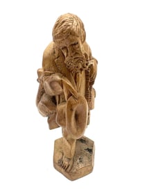 Hand-Carved Wooden Figure of a Traveler
