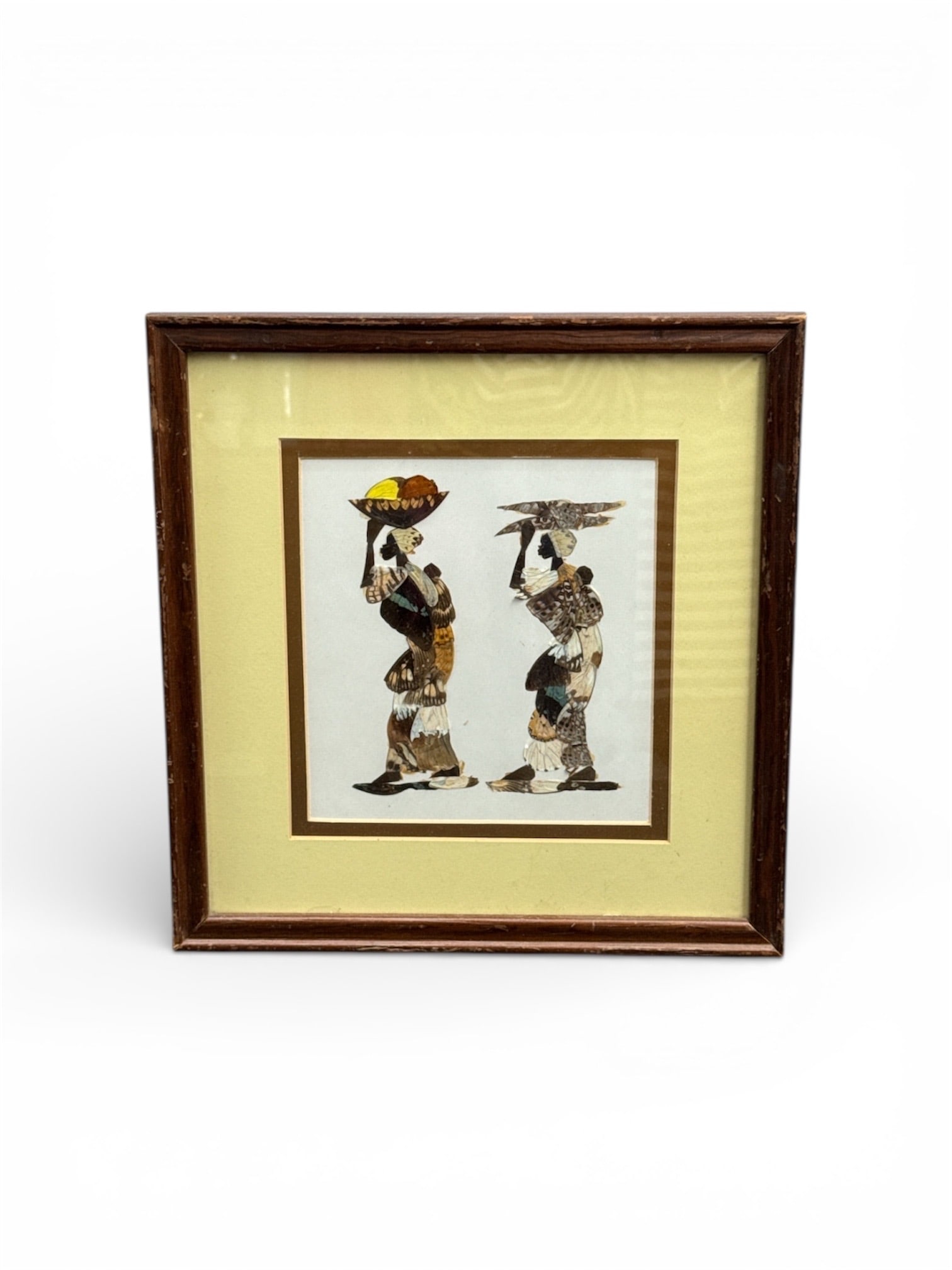 Butterfly African Folk Art - Two Figures Carrying Baskets: This decorative mixed media artwork depicts two stylized human figures walking in profile while carrying baskets, rendered in an African folk art–inspired collage style. The composition uses
