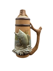Decorative Relief Stein with Woodland Scene and Figural Handle