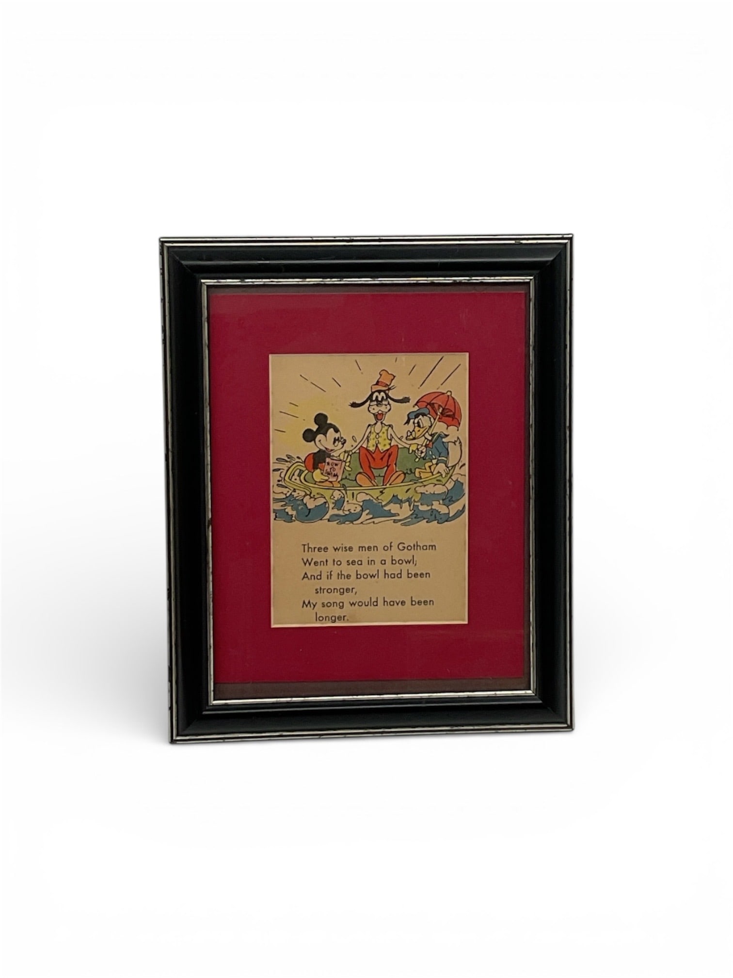 Vintage Disney Framed Book Page Mickey Mouse and Mother Goose: This vintage framed Disney book page is believed to originate from the classic children’s book titled Mickey Mouse and Mother Goose. The illustrated page features beloved Disney characters rende
