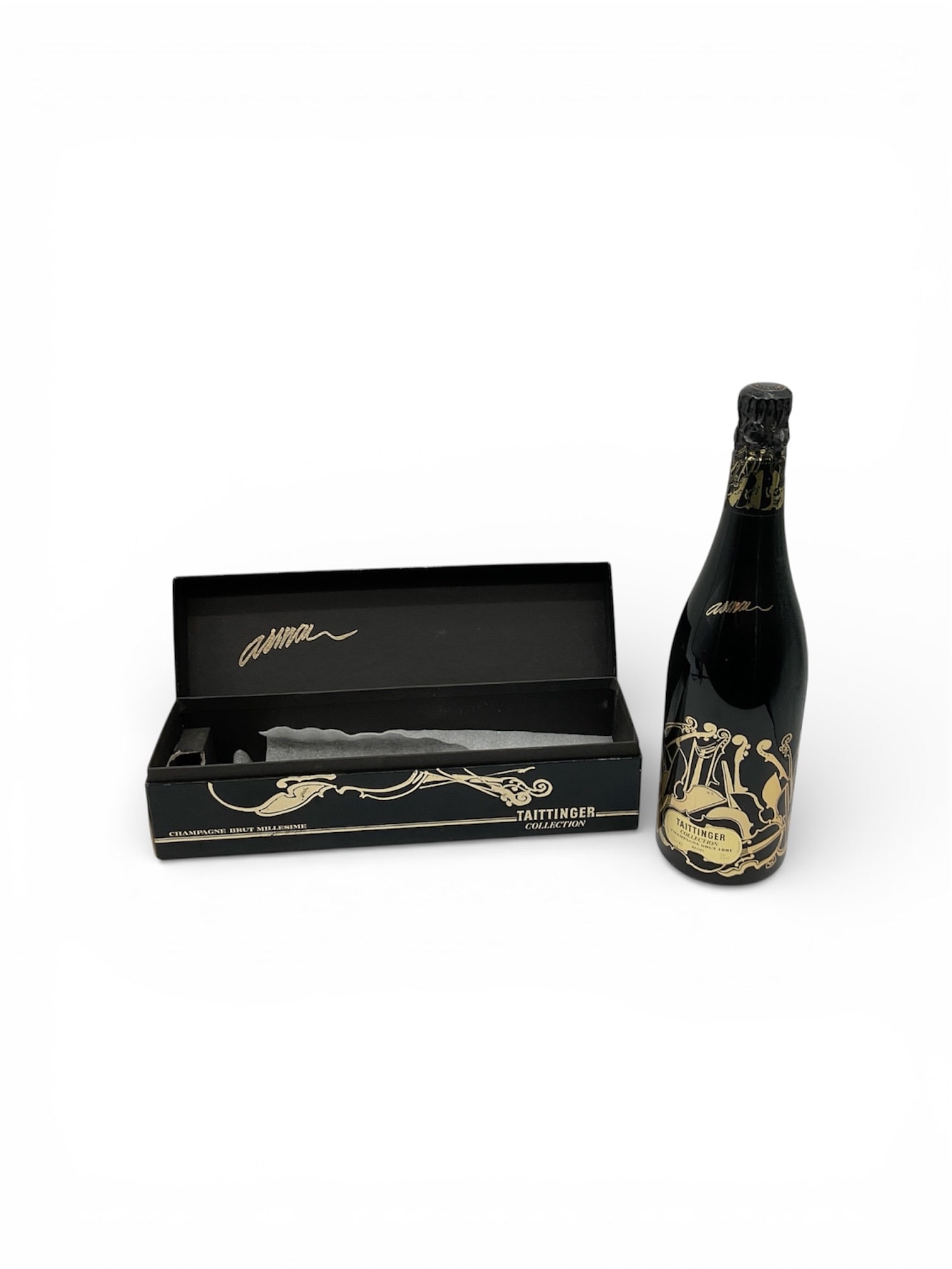 Taittinger Collection Arman 1981 Vintage Champagne Brut with Original Box: This lot features a rare and highly collectible bottle of 1981 Taittinger Collection Champagne, showcasing a design by the renowned French-American artist Arman. Released in 1985, this edition is