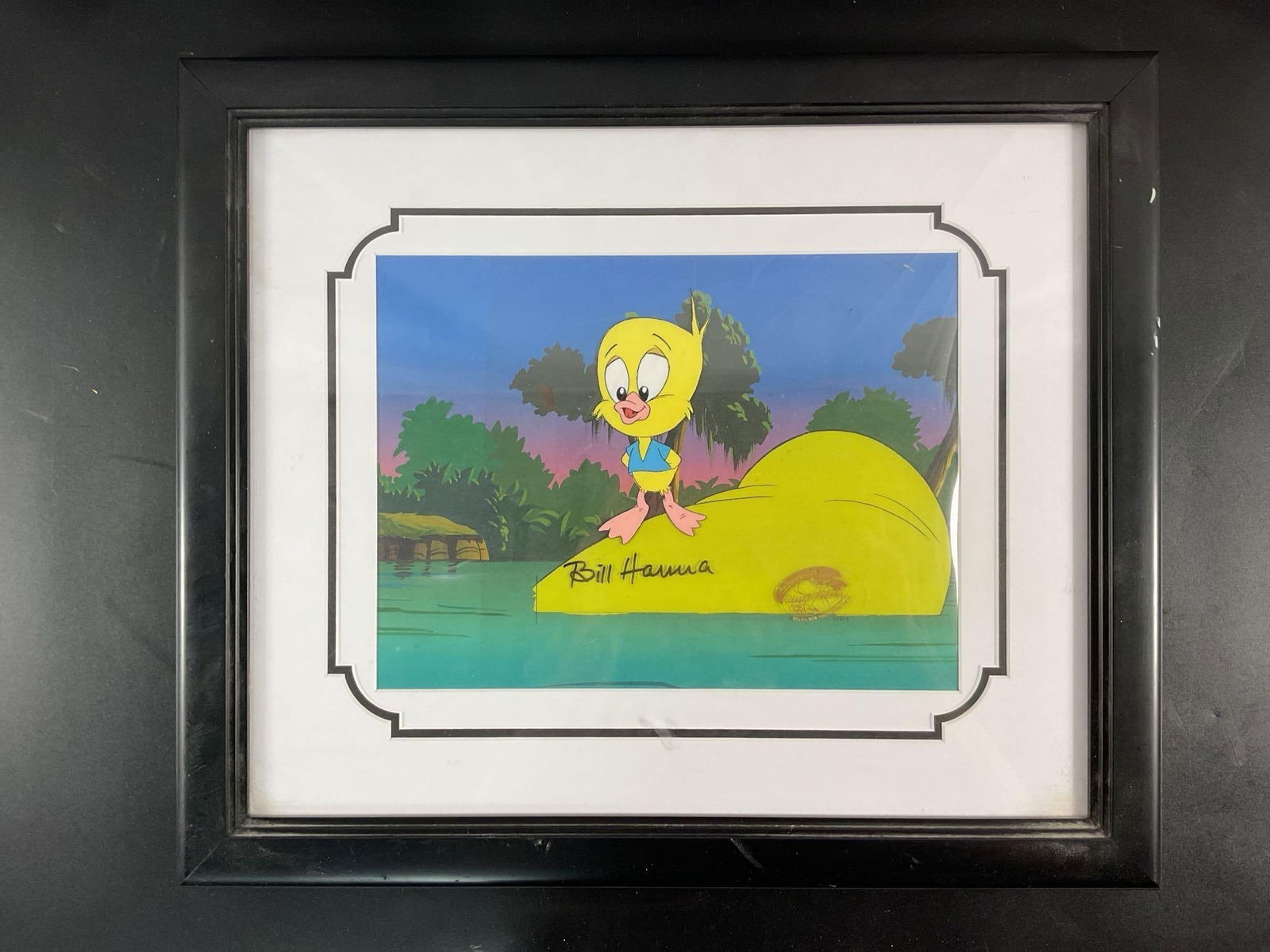 "Hard luck duck" by Hanna-Barbera Signed L.E. W/ COA: A hand-painted limited edition animation cel featuring Tweety Bird, the beloved Warner Bros. character, dressed in a scout-style outfit and perched atop what appears to be a prehistoric creature. The