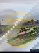 Vintage Schwarzburg Porcelain Cow Plate - Box 7 - Photo 18 - German: This vintage porcelain plate features a beautifully detailed pastoral scene with a woman in a burgundy dress and a child standing near a small body of water, surrounded by cows and horses. A