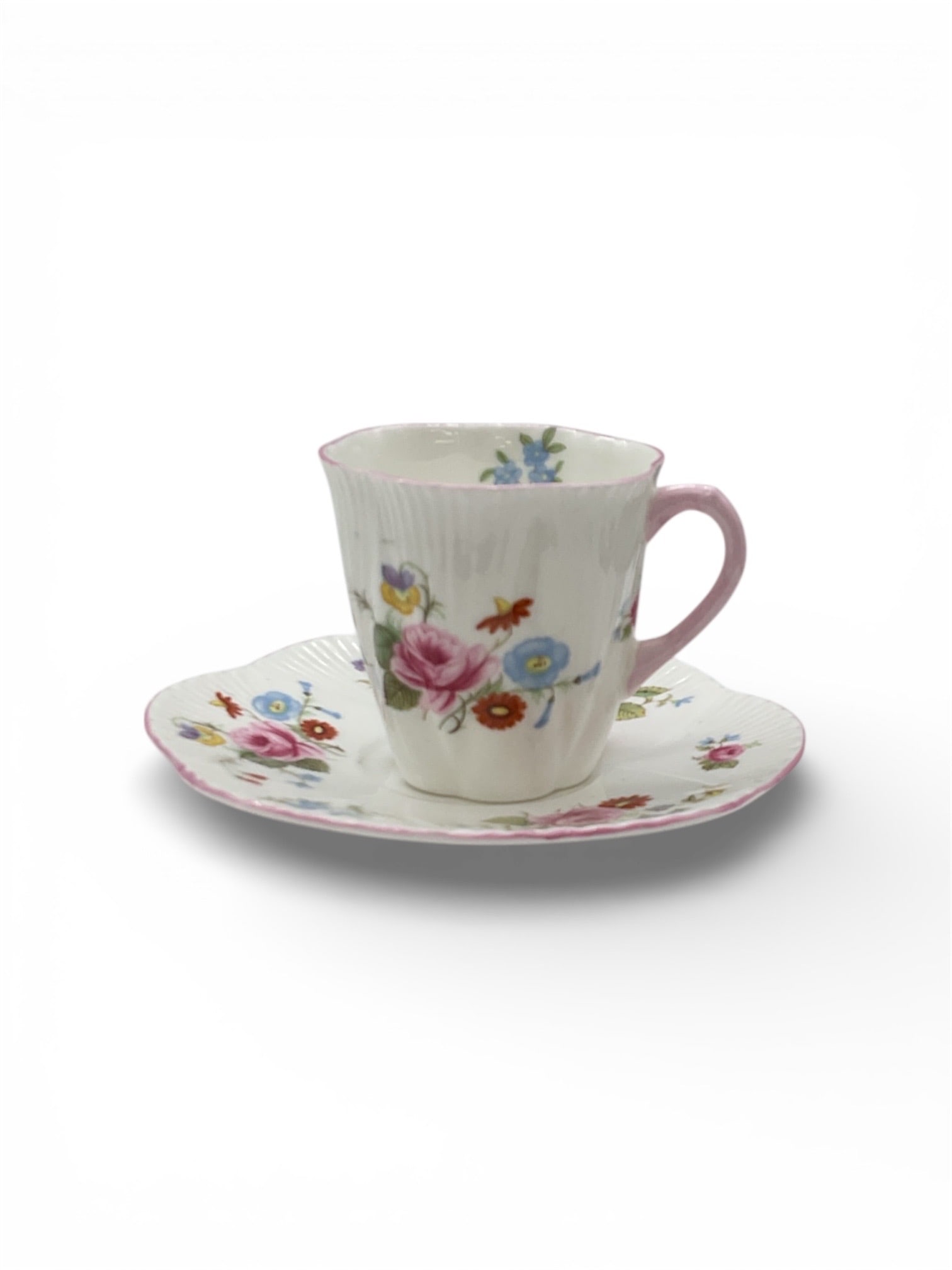 Vintage Shelley England Fine Bone China Floral Cup and Saucer Set: This delicate duo features a fine bone china cup and matching saucer from the renowned Shelley pottery of Staffordshire, England. The set is decorated with a vibrant multi-color floral motif, likely