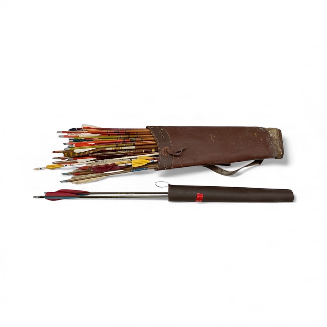 Vintage Archery Lot with Two Leather Quivers and Mixed Wooden Arrows: This vintage archery lot includes two leather quiver bags accompanied by a group of mixed wooden arrows in varying le