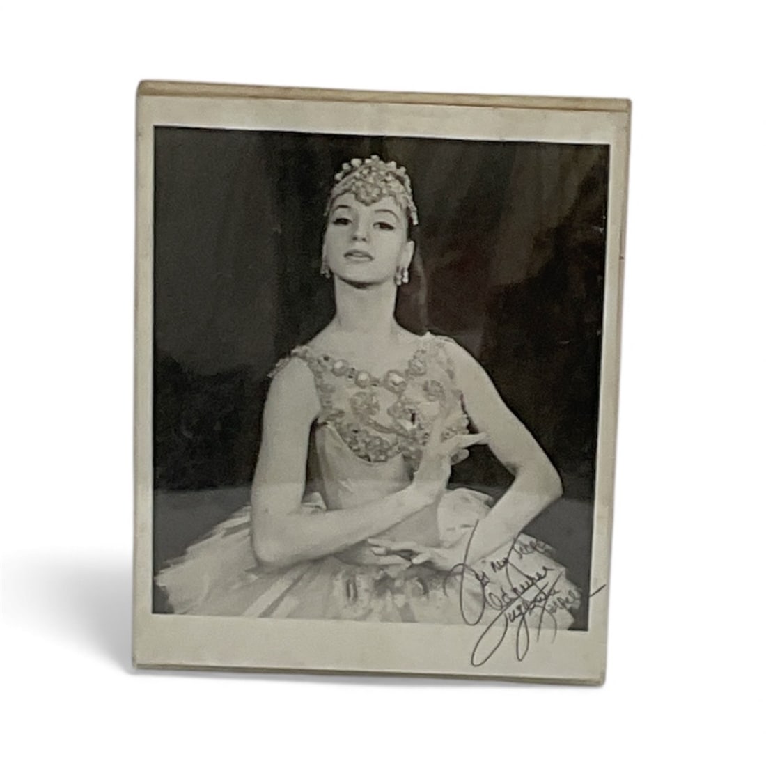 Vintage Signed Ballerina Photograph in Frame: Vintage black-and-white photographic portrait of a ballerina in full classical costume, elegantly posed with arms crossed at the waist. The photograph appears to be hand-signed in ink at the lower rig