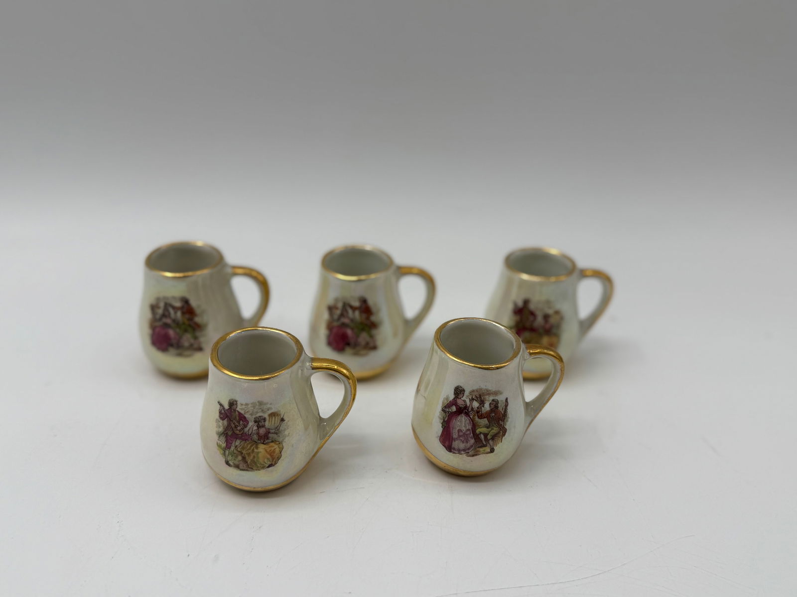 Set of Five Miniature Porcelain Mugs (1 of 2)
