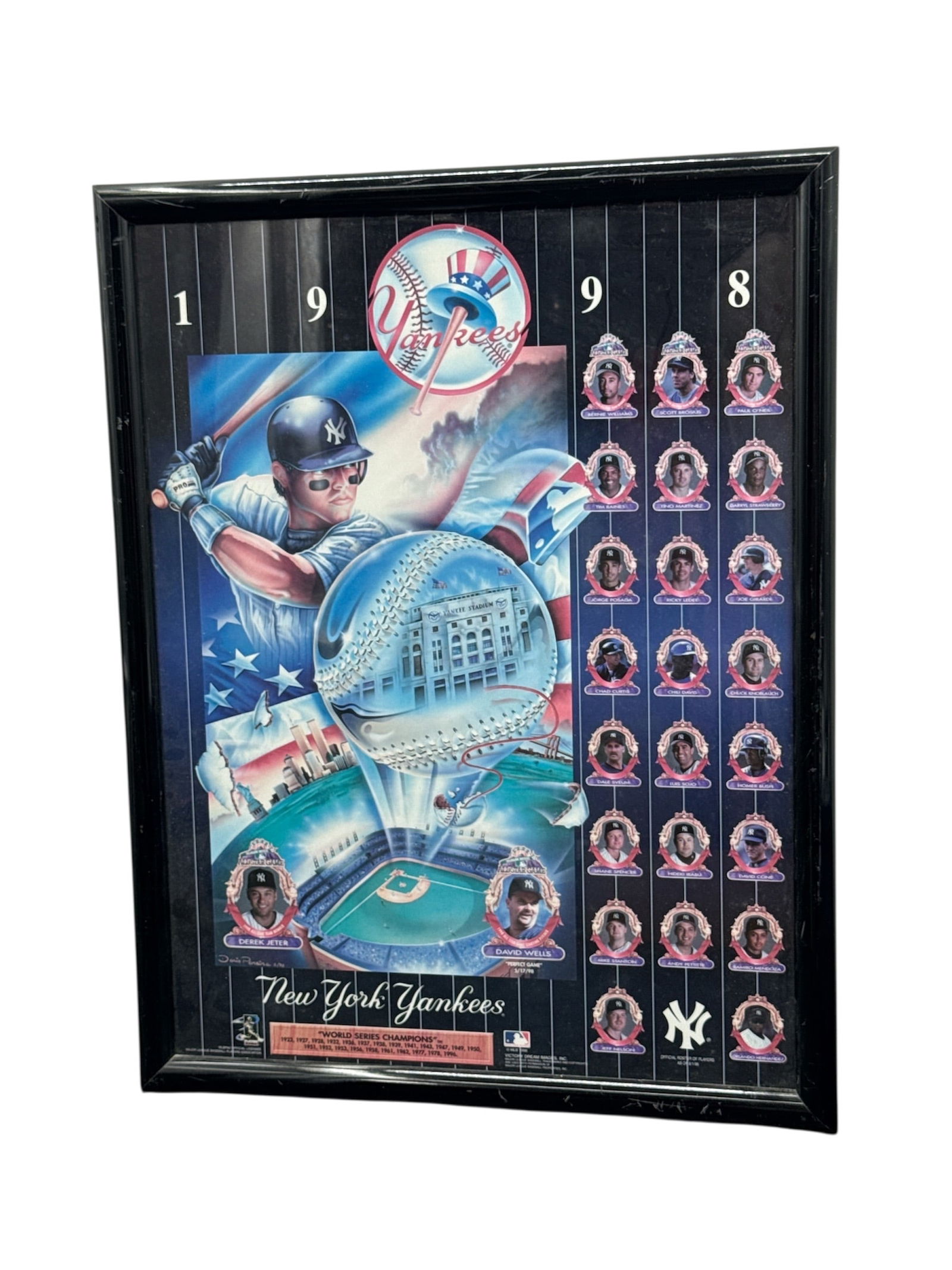 1998 New York Yankees Commemorative Framed Team Display: This framed commemorative display celebrates the legendary 1998 New York Yankees season, widely regarded as one of the greatest teams in Major League Baseball history. The artwork features a dramatic
