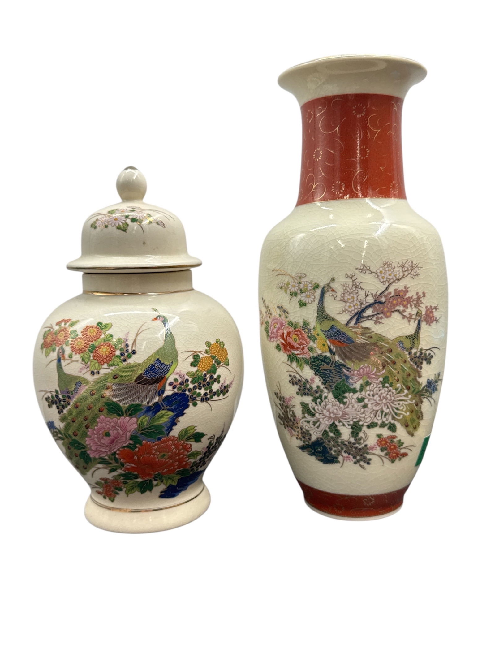 Pair of Asian Porcelain Vase and Covered Jar with Floral and Bird Decoration: This lot features a decorative pair of Asian porcelain vessels comprising a tall vase and a smaller covered jar. Both pieces are richly decorated with colorful floral arrangements and bird motifs, ren