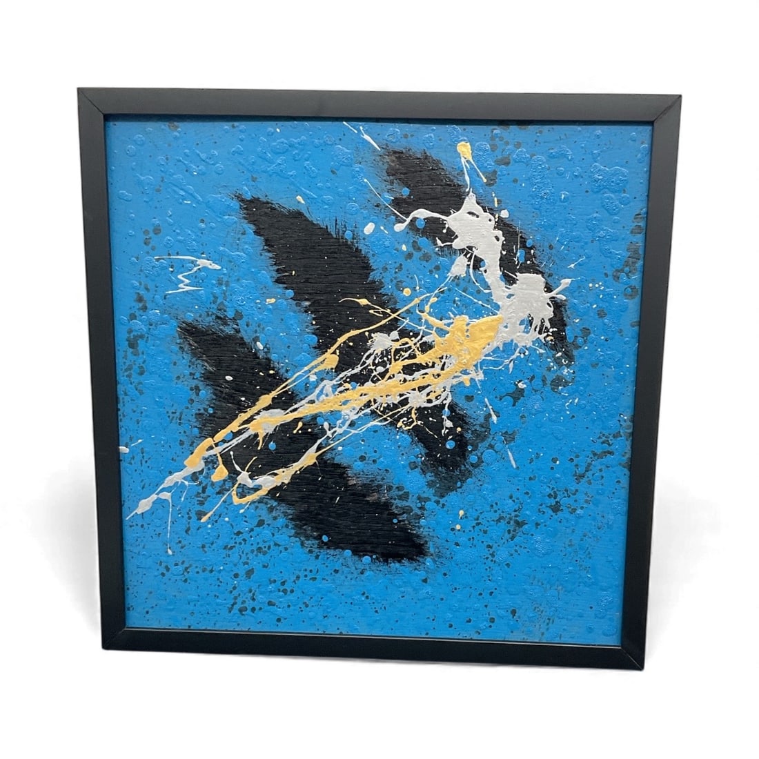 Miguel Angel-Jimenez – Blue and Black Abstract: Striking abstract piece featuring a vivid blue background with bold black forms and energetic splashes of white and gold, showcasing Miguel Angel-Jimenez’s signature dynamic technique.