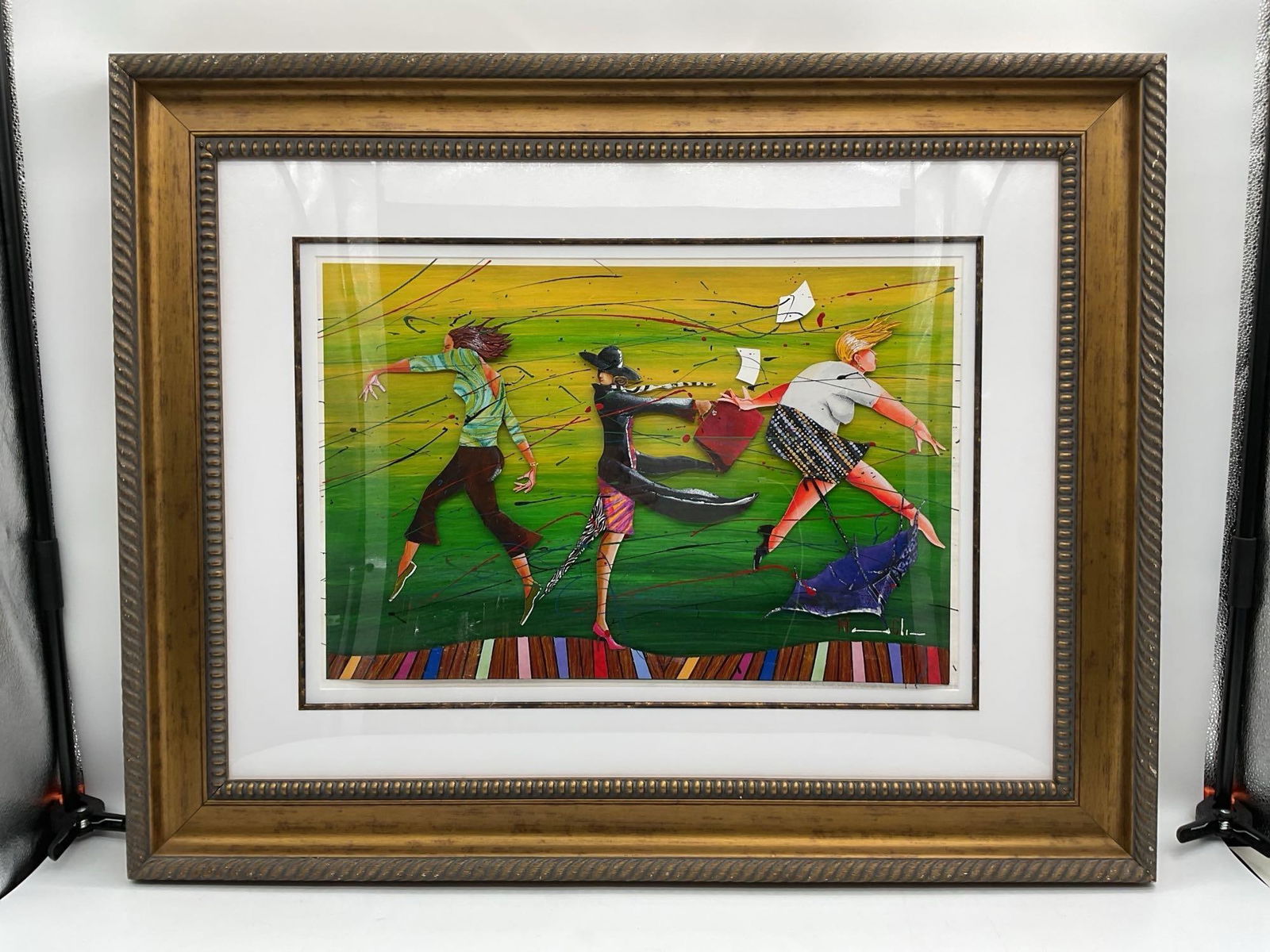 "Green Storm with Three" by Marcus Glenn (American, b.1968) Mixed Media: Vibrant mixed media artwork by Marcus Glenn titled Green Storm with Three, featuring three expressive figures walking against strong wind with dynamic movement and textured elements. The scene