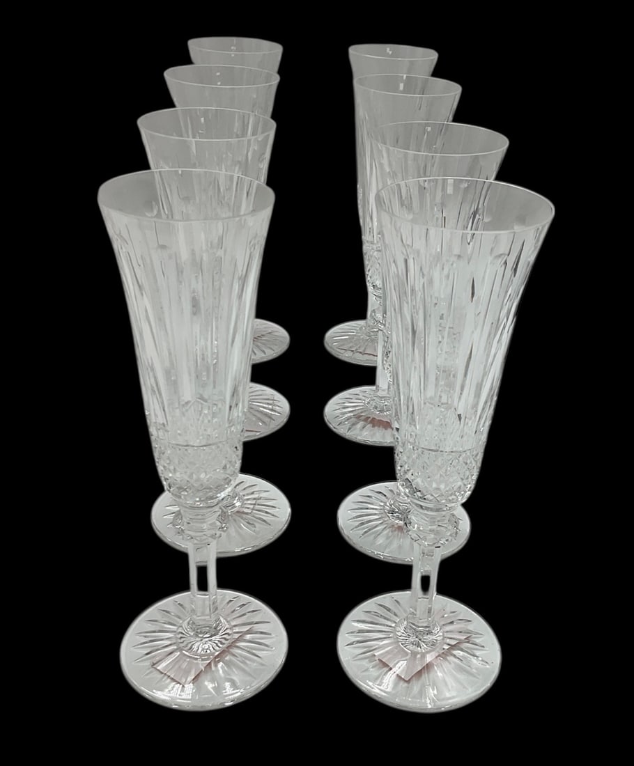 Set of 10 Saint-Louis Tommy Model Crystal Champagne Flutes: This is a superb set of ten (10) cut crystal champagne flutes from the renowned Saint-Louis crystalworks. The glasses feature the iconic Tommy pattern, celebrated for its rich,