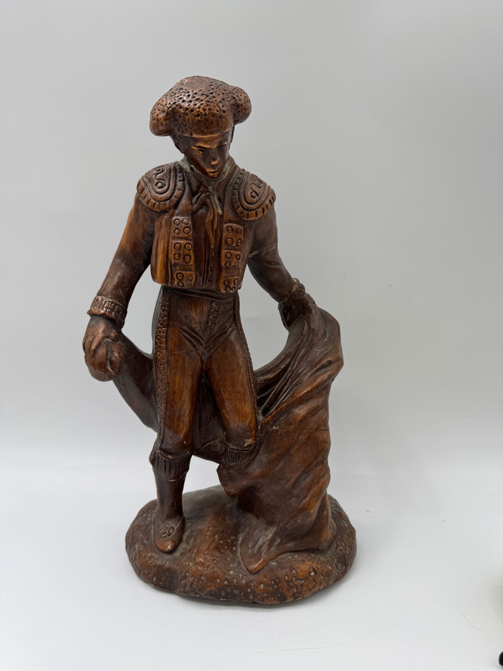 1977 Matador Sculpture: Vintage bullfighter sculpture by Hope D'Orsi Inc., dated 1977. Depicts a matador with cape. Measures approximately 15.5 x 8 inches.