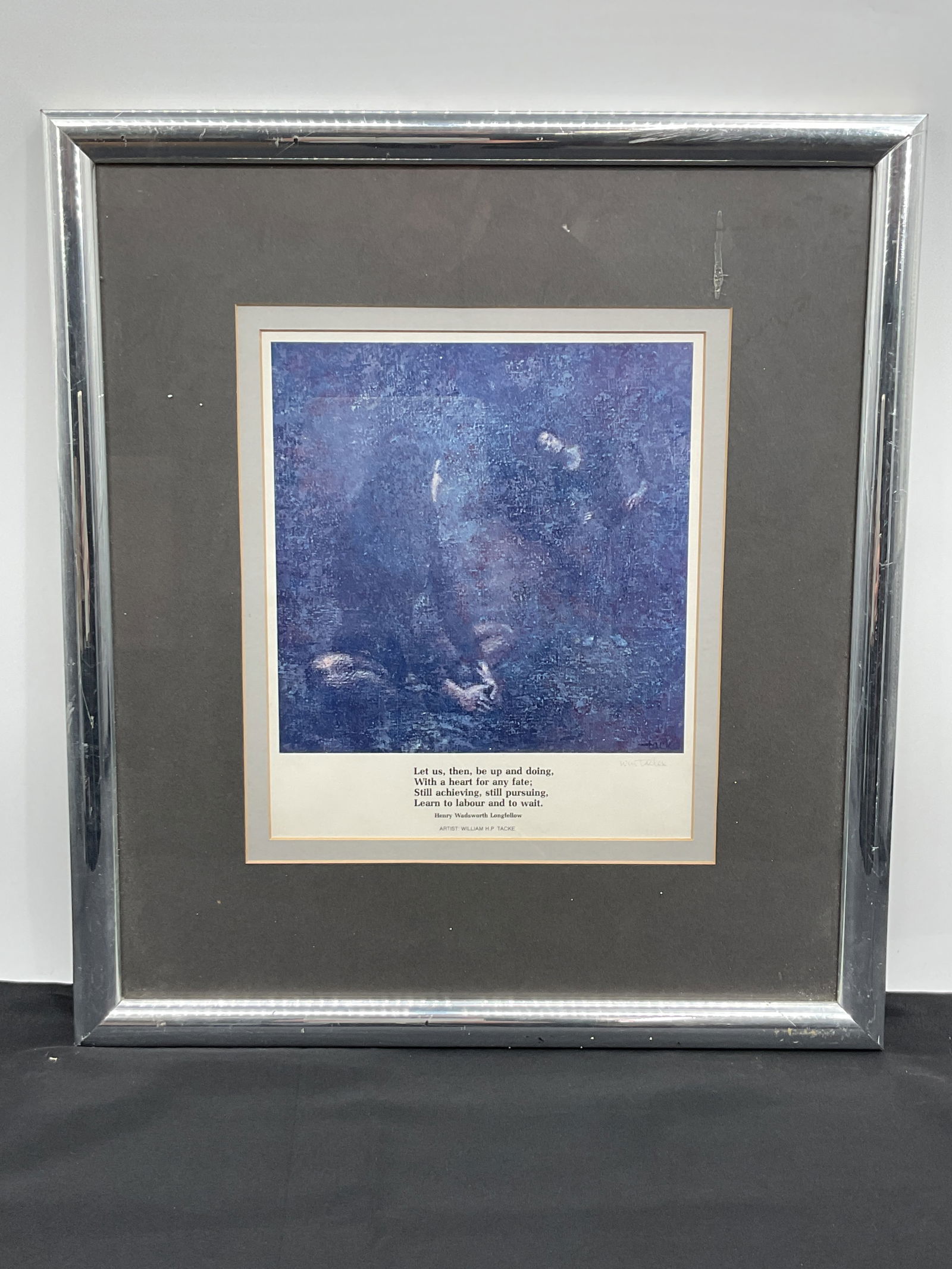 Framed Print of Painting with Longfellow Quote: Framed print featuring a reproduction of a painting with a quote from Henry Wadsworth Longfellow. The print is matted and framed in a silver-tone frame. Dimensions: 20" H x 17" L.