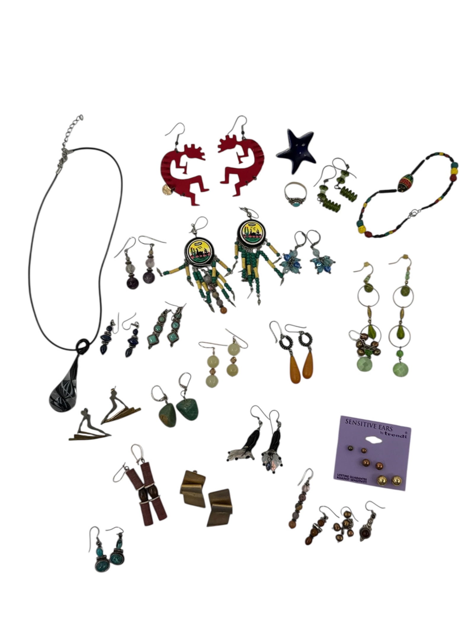 Gloria Landsman Pierce Handcrafted Jewelry Collection Group: This diverse collection features a large assortment of handcrafted jewelry created by artist Gloria Landsman Pierce, known for her imaginative studio jewelry and wearable art. The group includes