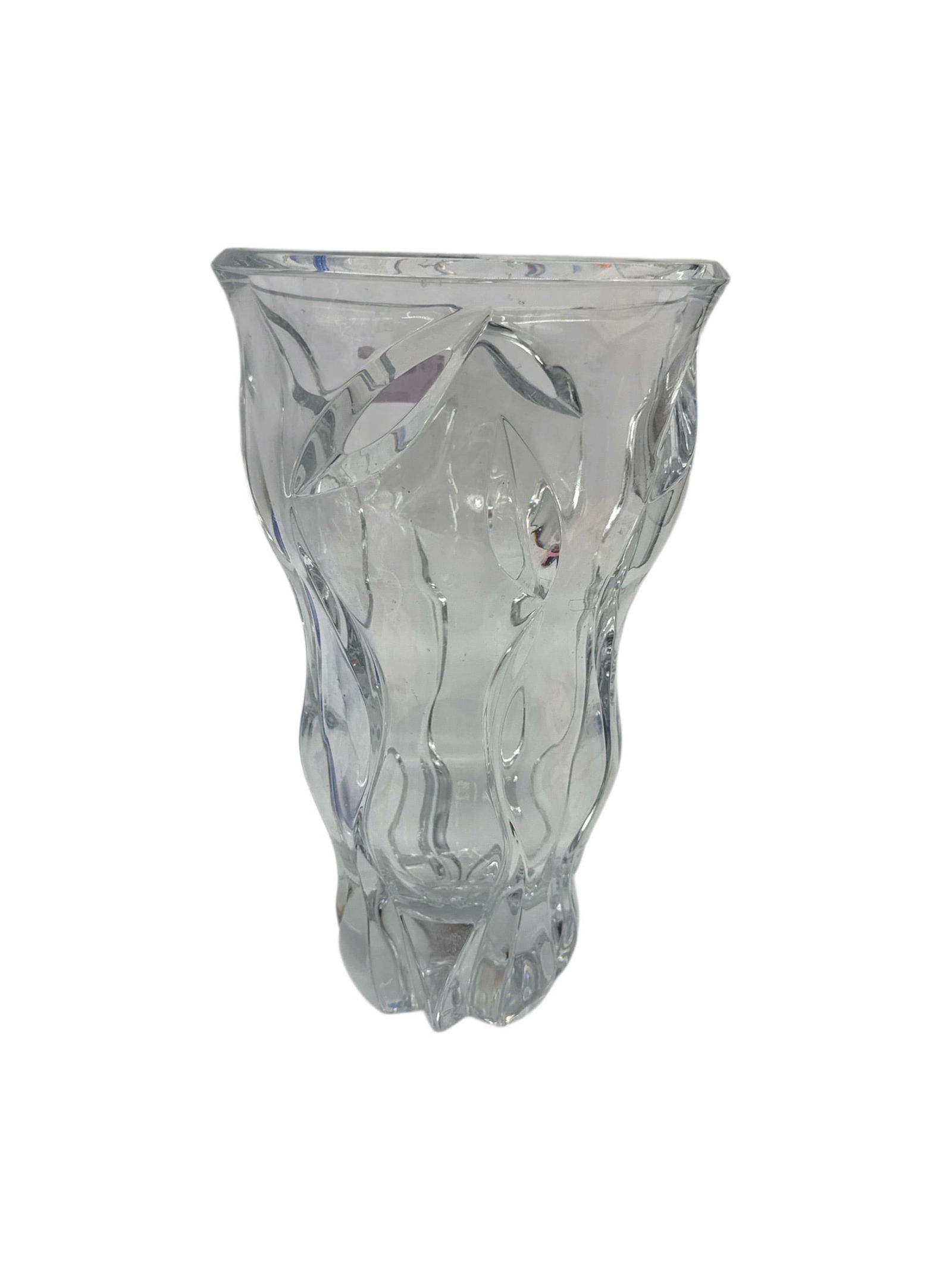Clear Art Glass Sculptural Vase: This sculptural clear art glass vase features an organically formed body with flowing, textured contours that create visual movement and depth. The vase flares gently at the rim and tapers toward a th